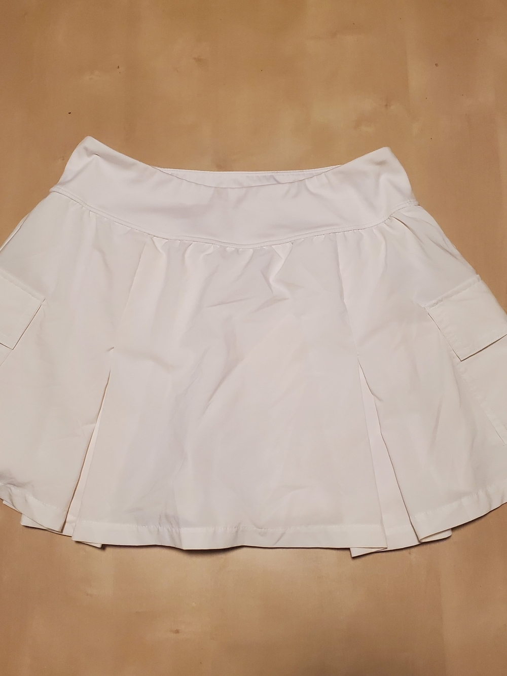 Classic White Pleated Mini Skirt with Flared Panels
